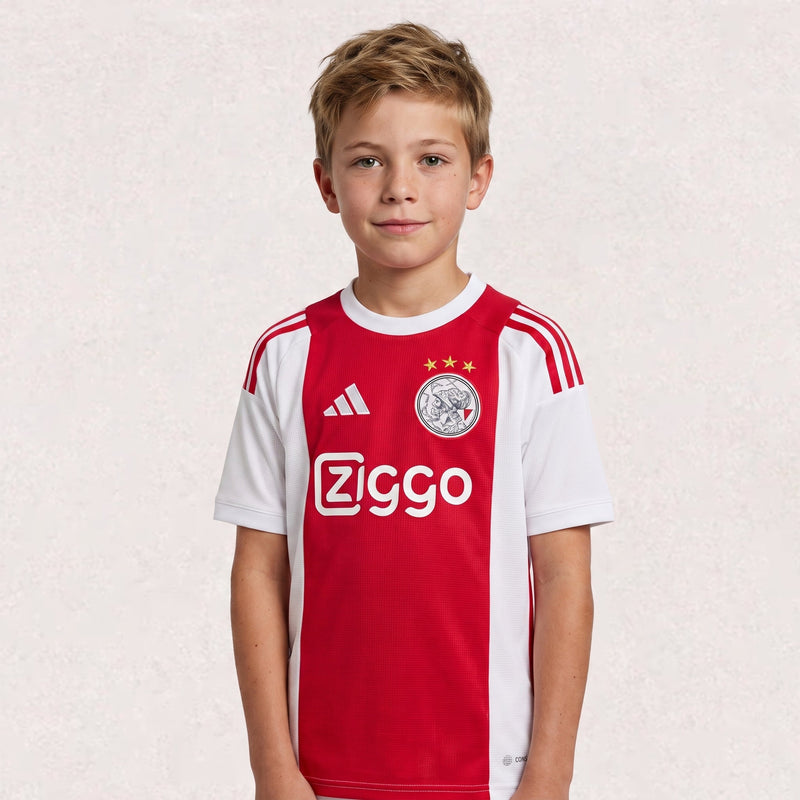 Maillot Ajax domicile 2026/27, version supporter pour enfant, environ 43–63 × 32–46 cm